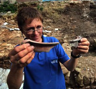 Israeli archaeologist Yardena Alexandre inspects Roman 1st-century pottery found from the city of Nazareth.